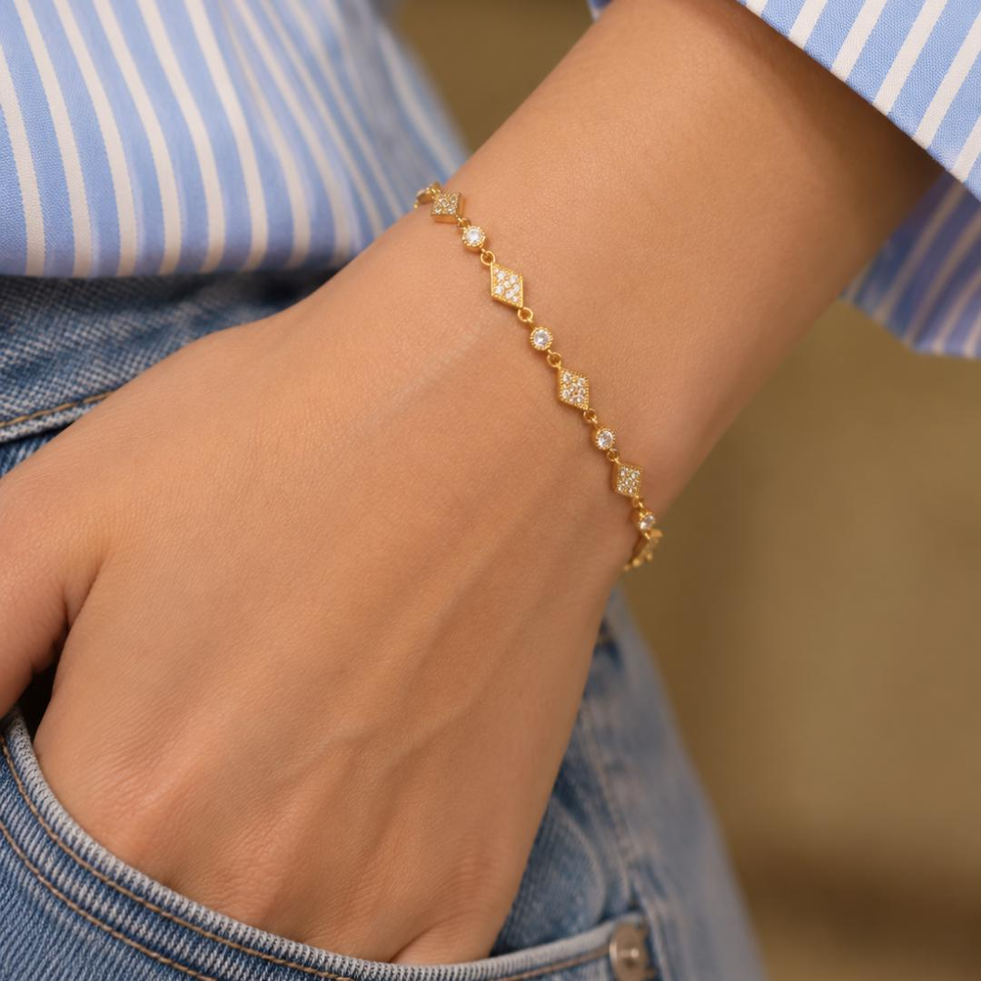Art Deco Diamond Station Bracelet in yellow gold worn on wrist