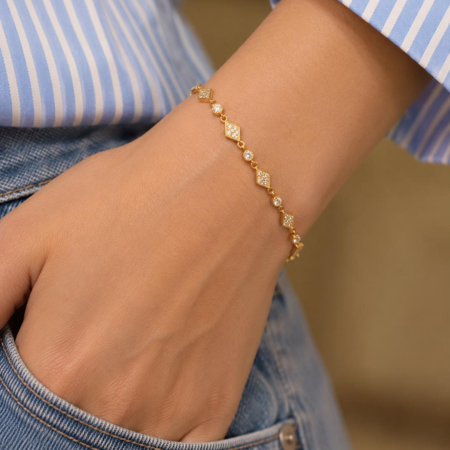 Art Deco Diamond Station Bracelet in yellow gold worn on wrist