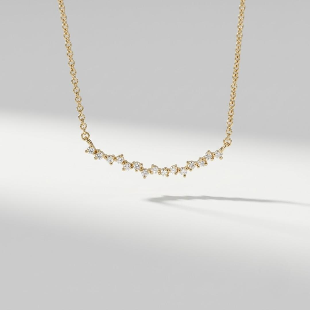AuvelleCo curved cluster diamond necklace in solid yellow gold