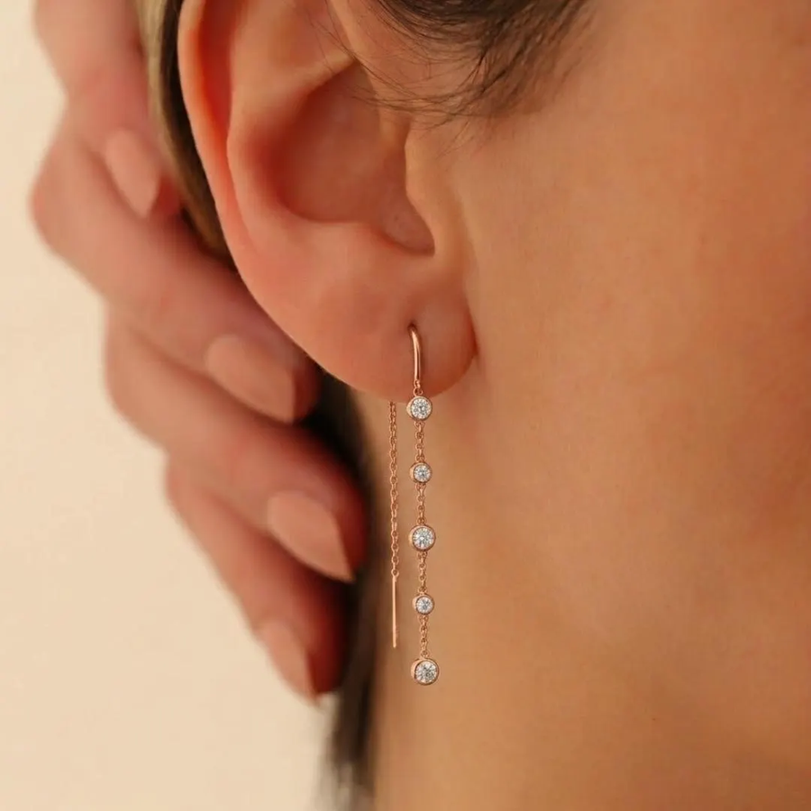 Five diamond bezel threader drop earrings by AuvelleCo, view 1