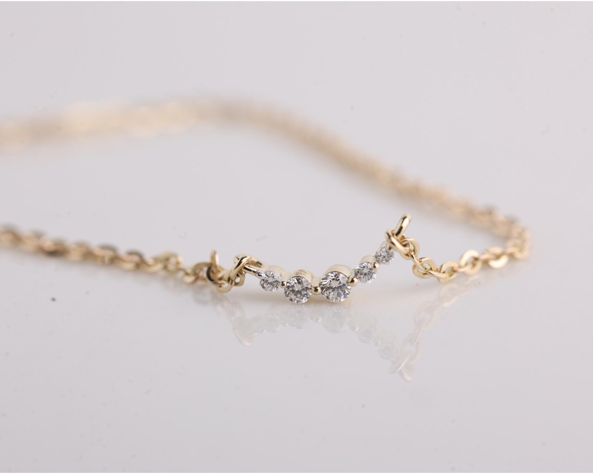 AuvelleCo graduated five diamond bar necklace in yellow gold