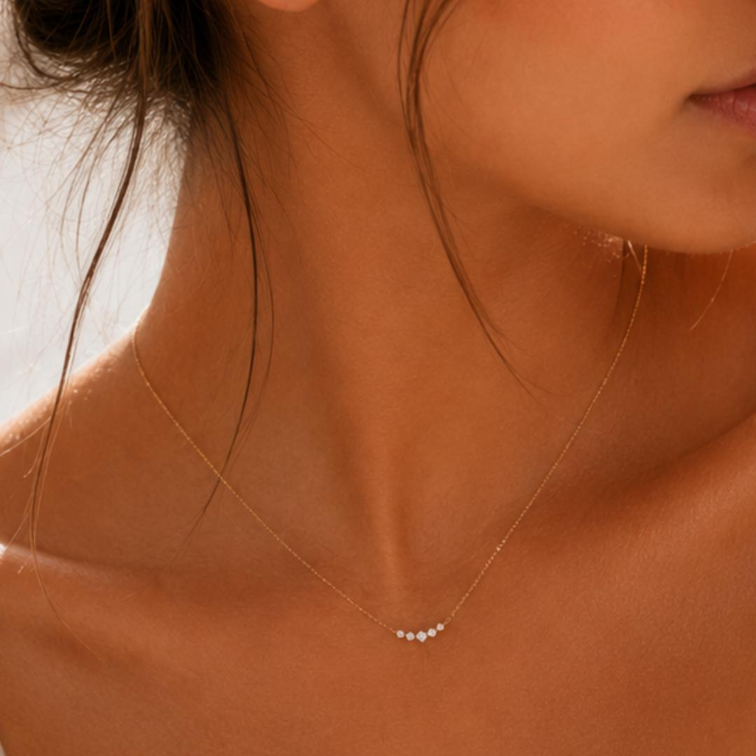 AuvelleCo graduated five diamond bar necklace in yellow gold