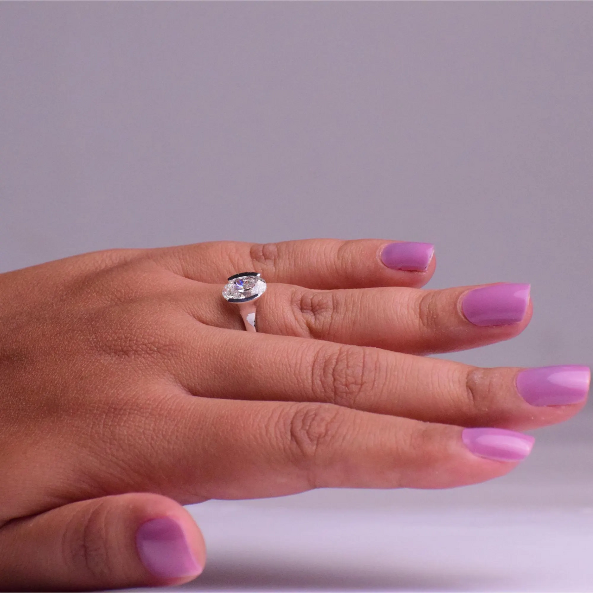 AuvelleCo oval diamond half bezel solitaire engagement ring - view 1