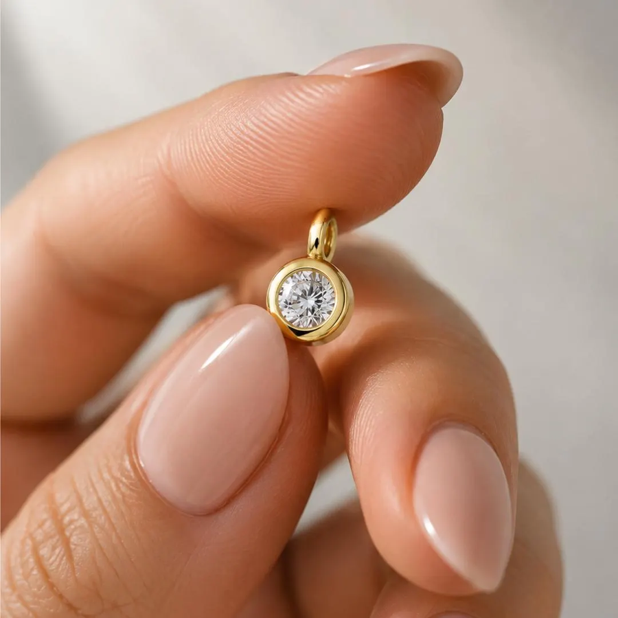 AuvelleCo round bezel diamond solitaire pendant in yellow gold