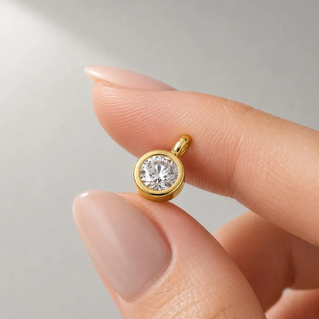 AuvelleCo round bezel diamond solitaire pendant in yellow gold