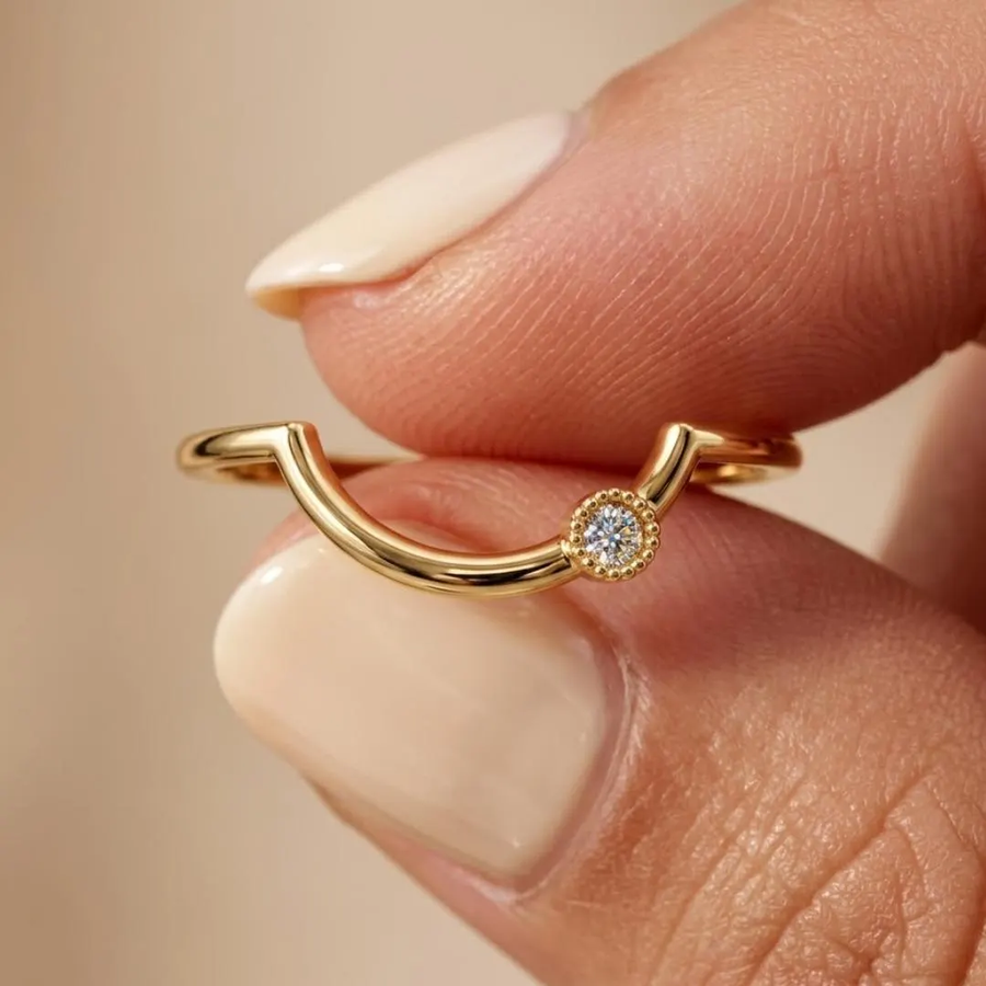 AuvelleCo curved diamond contour wedding band in yellow solid gold with milgrain style bezel