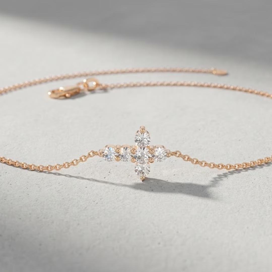 Diamond Cross Chain Bracelet in yellow gold with prong set diamonds