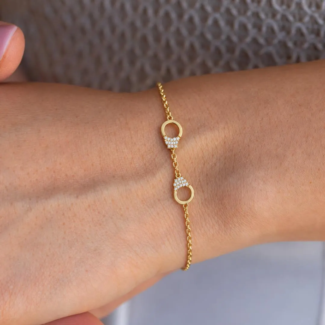 Diamond Handcuff Chain Bracelet — Yellow gold wrist close-up