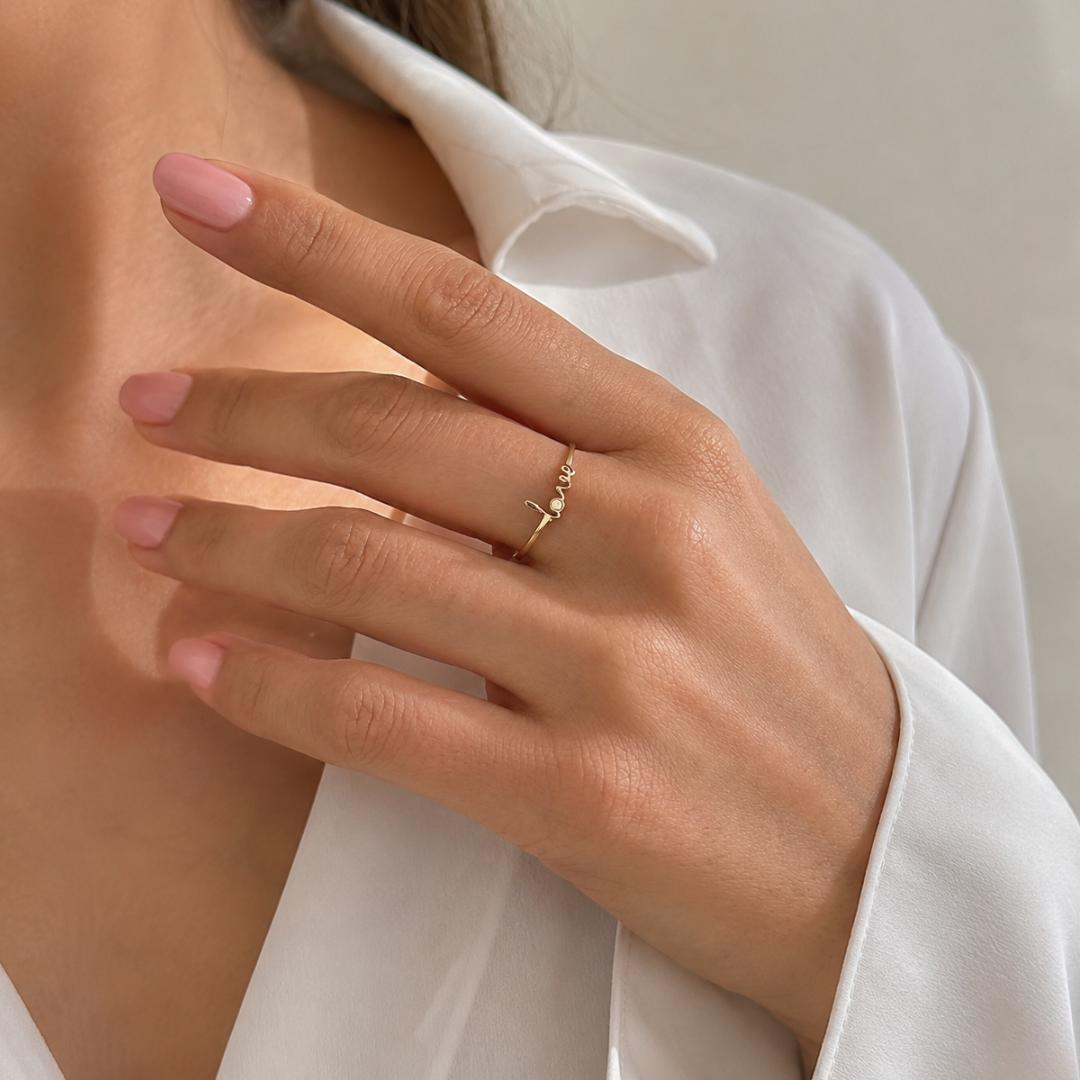 AuvelleCo solid gold love script promise ring with bezel style diamond accent