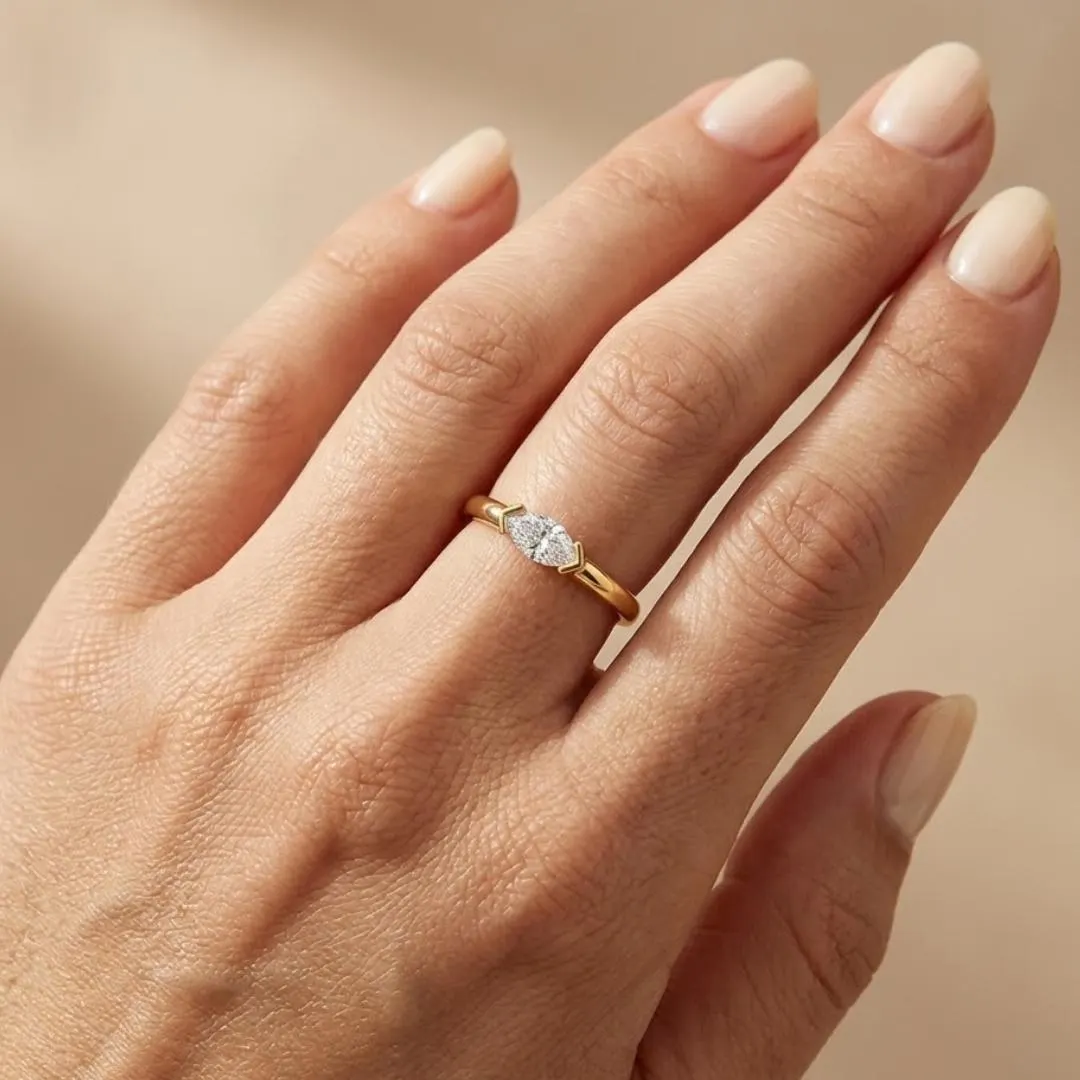 AuvelleCo east west marquise diamond solitaire ring in yellow solid gold