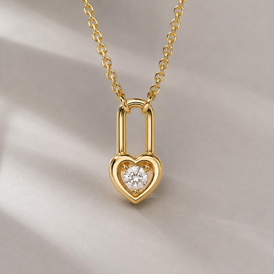 AuvelleCo yellow gold heart lock diamond pendant; chain shown for styling and not included