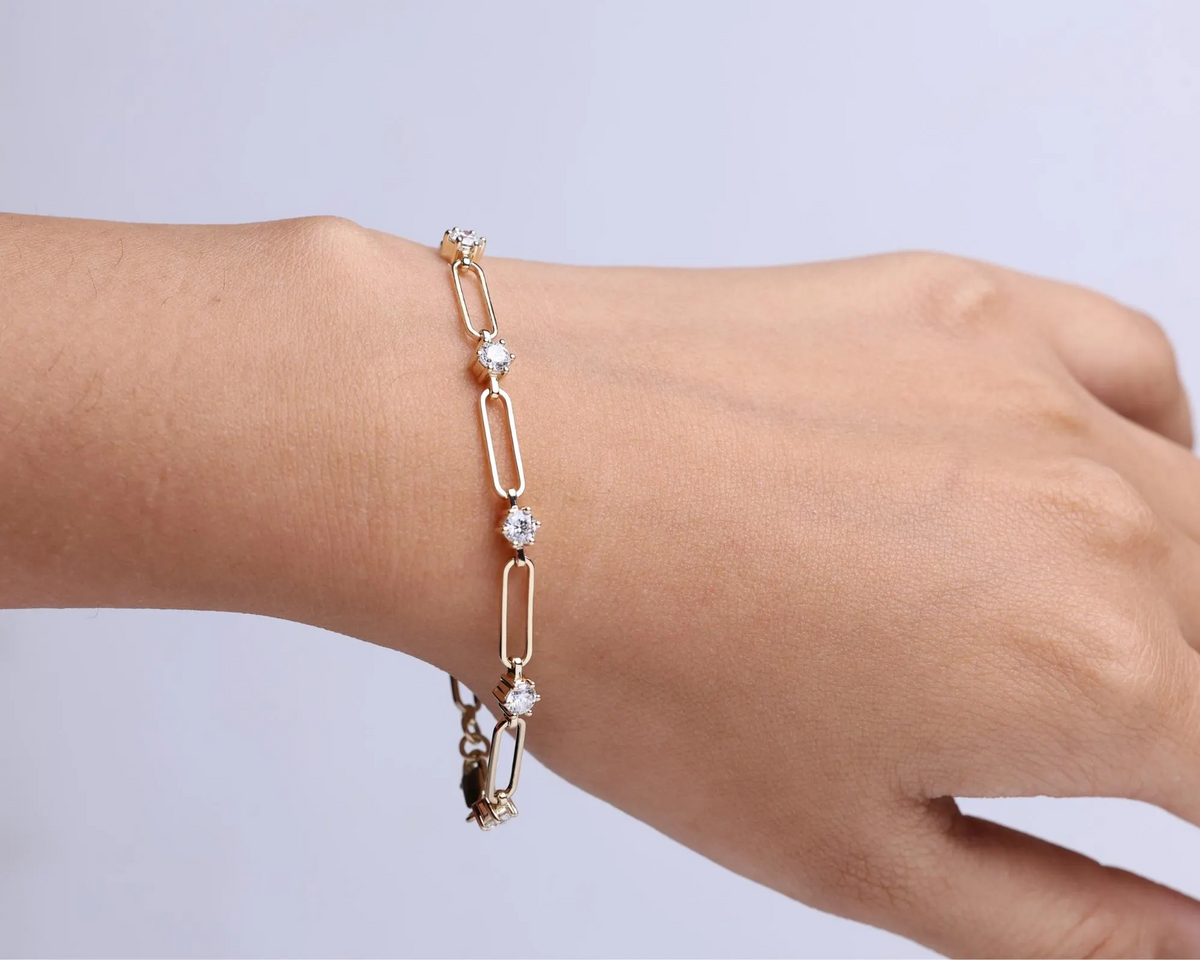 Paperclip Diamond Station Bracelet worn on wrist, view 1