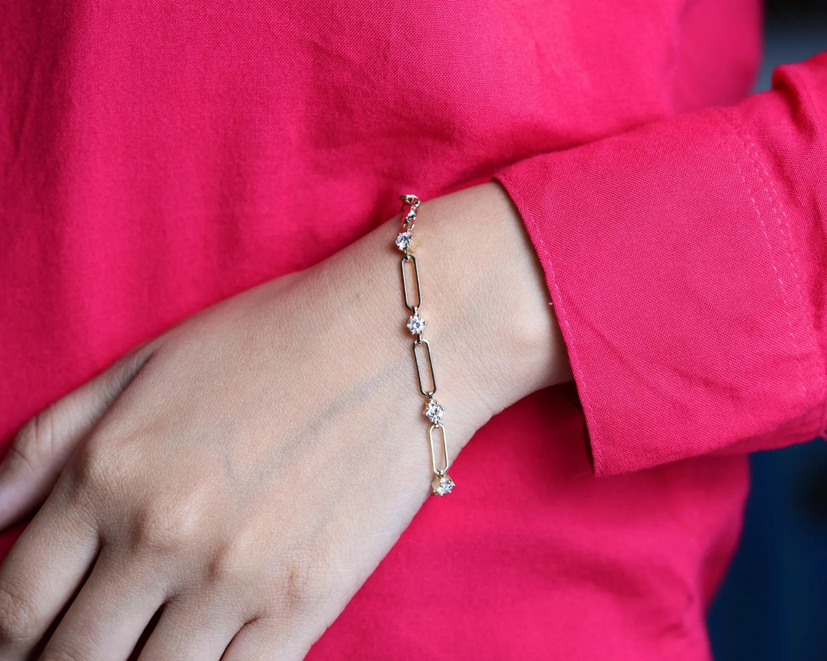 Paperclip Diamond Station Bracelet worn on wrist, view 4