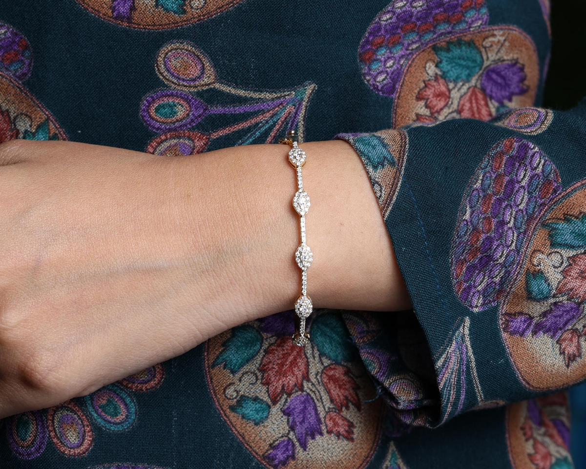 Pave Halo Diamond Bangle Bracelet worn on wrist, view 4