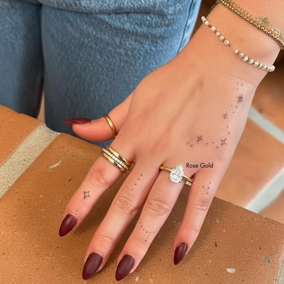 Pear cut diamond solitaire engagement ring in rose gold