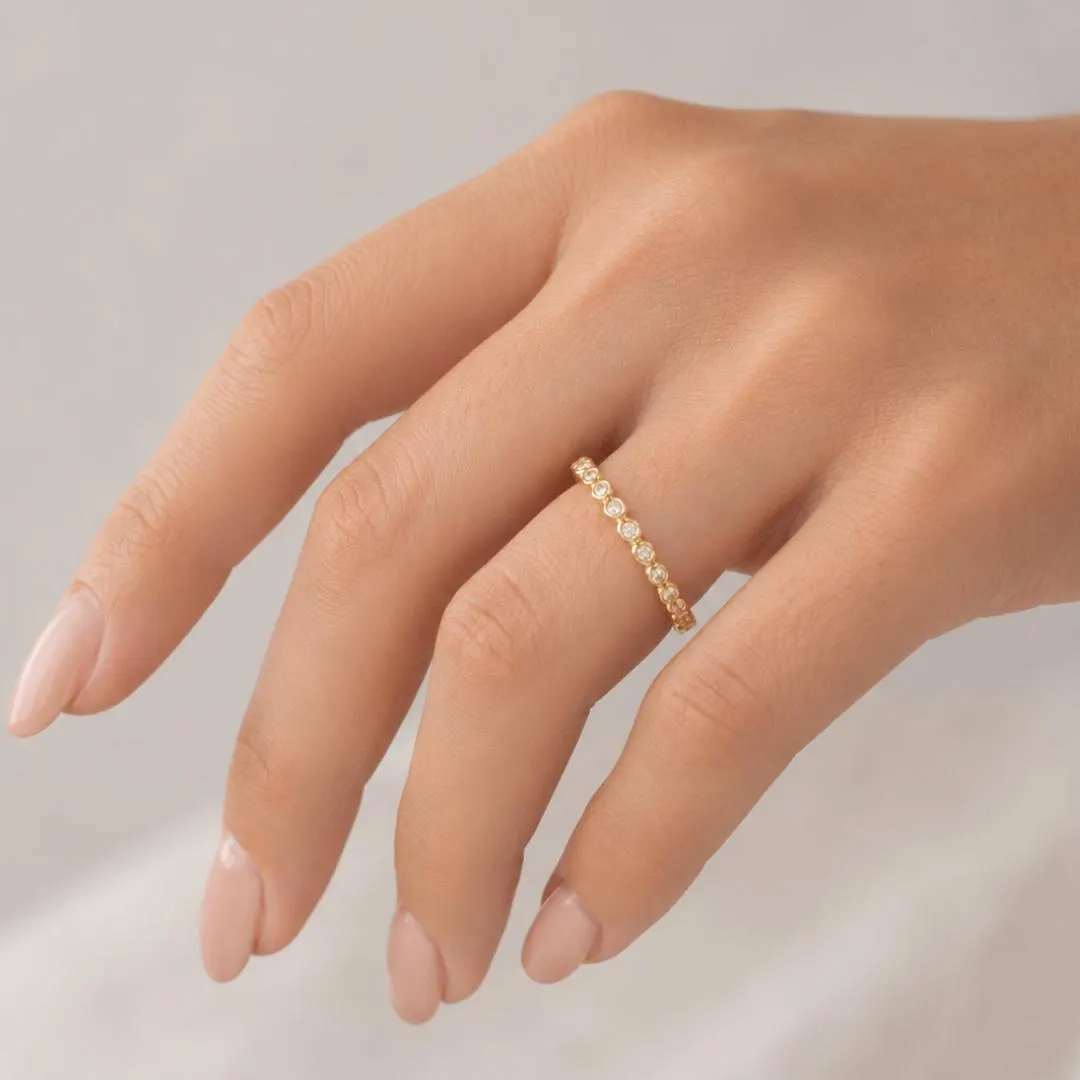 AuvelleCo round diamond full bezel eternity band in solid gold
