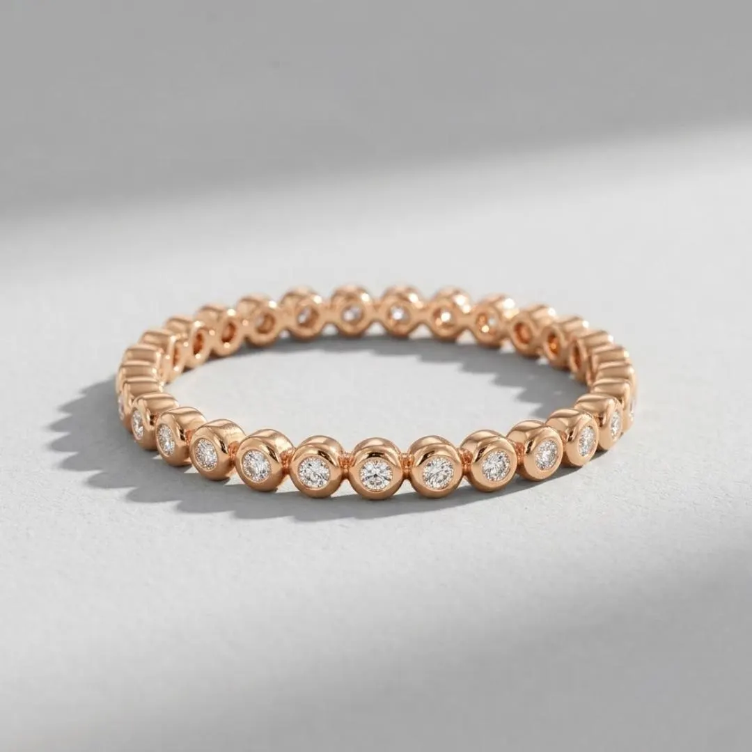 AuvelleCo round diamond full bezel eternity band in solid gold