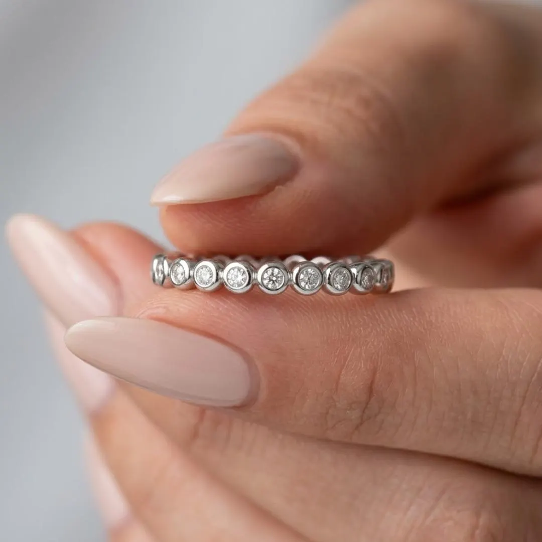 AuvelleCo round diamond full bezel eternity band in solid gold