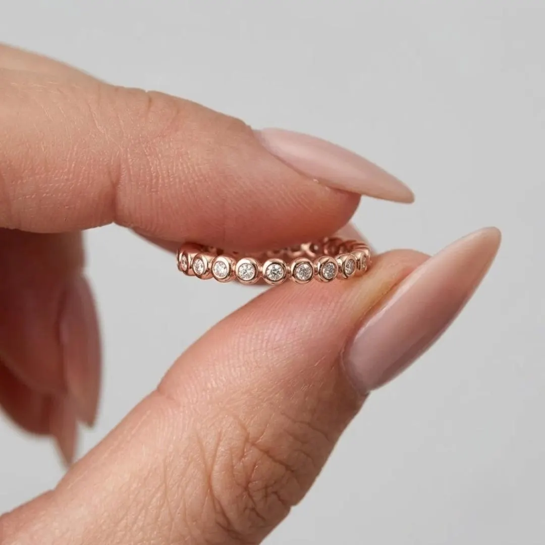 AuvelleCo round diamond full bezel eternity band in solid gold