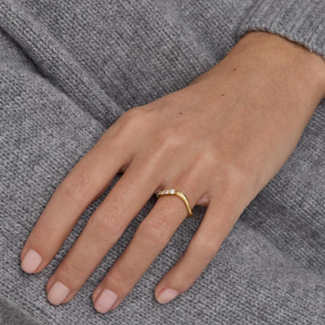 AuvelleCo semi flow pave diamond curved wedding band in yellow solid gold
