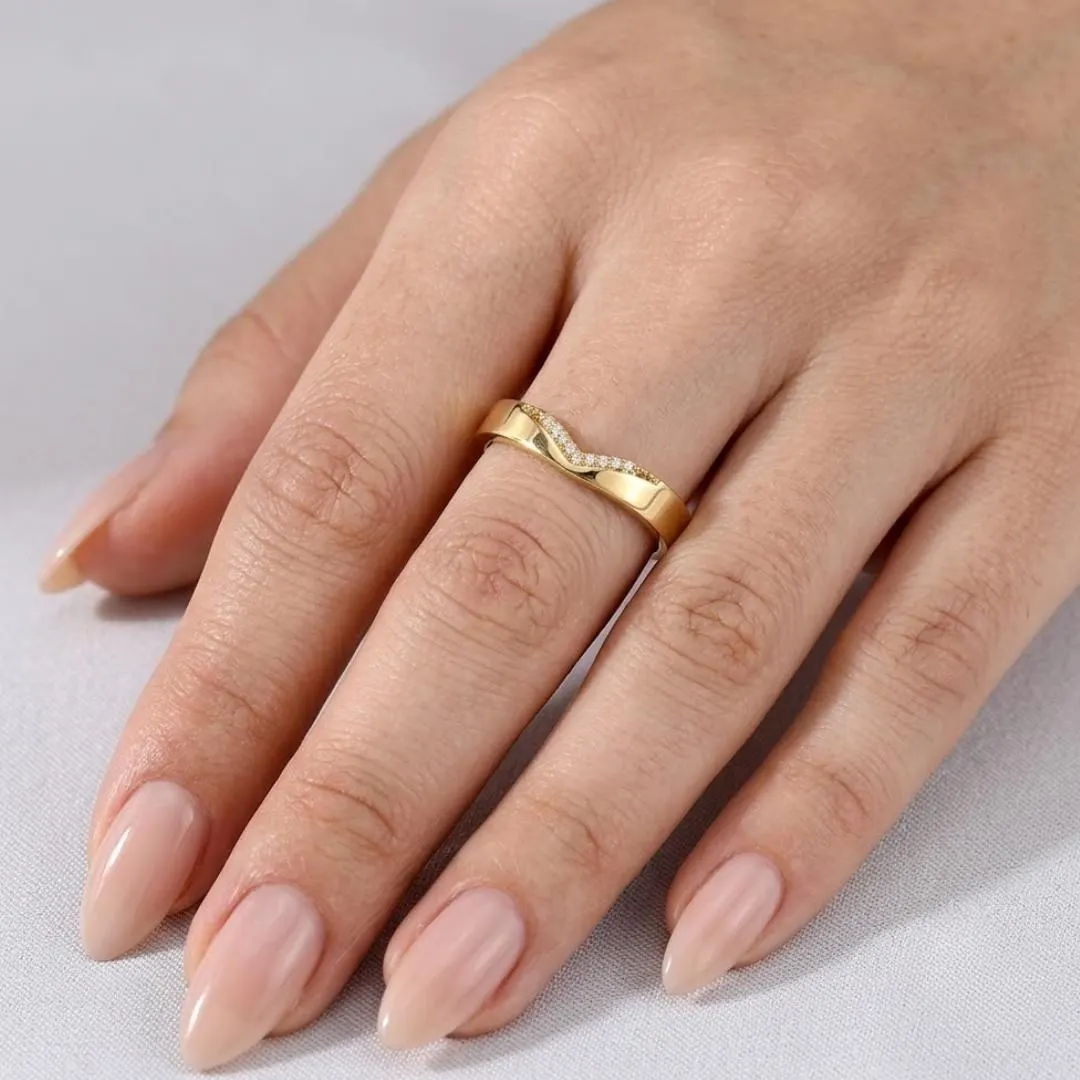 V Shaped Diamond Chevron Wedding Band — Yellow gold worn on hand